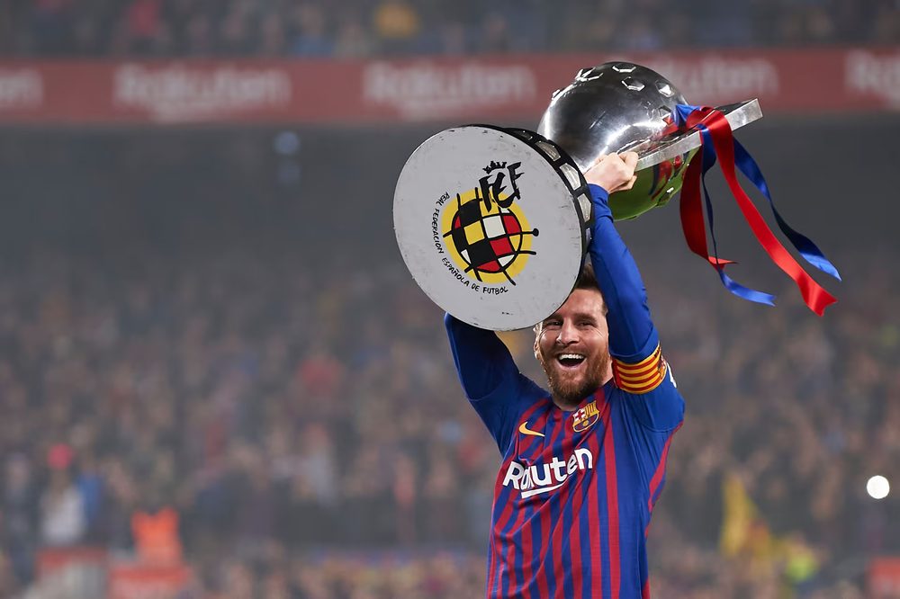 Messi lifting the La Liga trophy